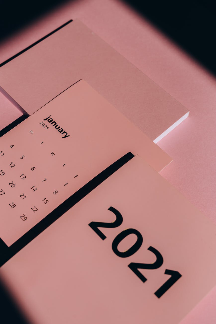 annual calendar with dates on pink background