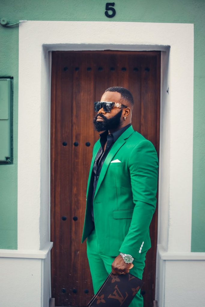 10 Unisex Colours You Can Wear 10 portrait of man in green suit