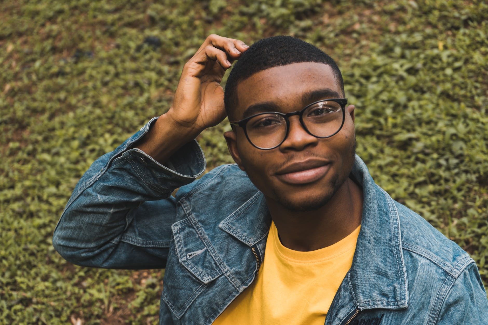 a man wearing a black framed eyeglasses