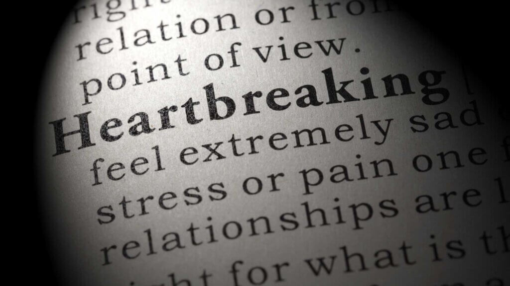 signs you're still heartbroken